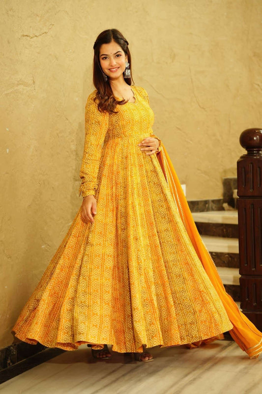 Beautiful and Stylish Full Flair Gown for Women In Yellow Color